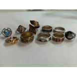 Ten assorted rings.