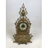 A French gilt brass mantle clock in the Rococo style with movement by Japy Freres Paris. Untested,