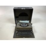 A vintage Imperial Typewriter - The good Companion Model T. Untested. Cased with original brush
