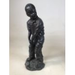 Bronze figure of a boy playing golf, in putting stance. W:21.5cm x D:18.5cm x H:56.5cm