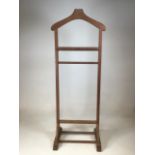 A gentlemans valley stand with shoe rack to base. W:50cm x D:35cm x H:128cm