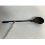 An early bronze spoon. H:10cm