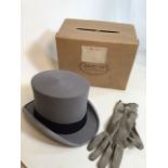 A grey vintage top hat by Dunn & Co with original box together with a pair of grey suede gloves