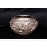 A large Indian silver bowl decorated with detailed hunting and animal scenes. With detail to base.