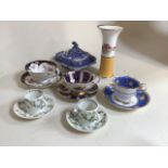 Three cabinet cups to include Coalport and Paragon together with two paragon coffee cans, a