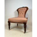 A Victorian button back mahogany bedroom chair with brass and ceramic castors Seat height H:40cm