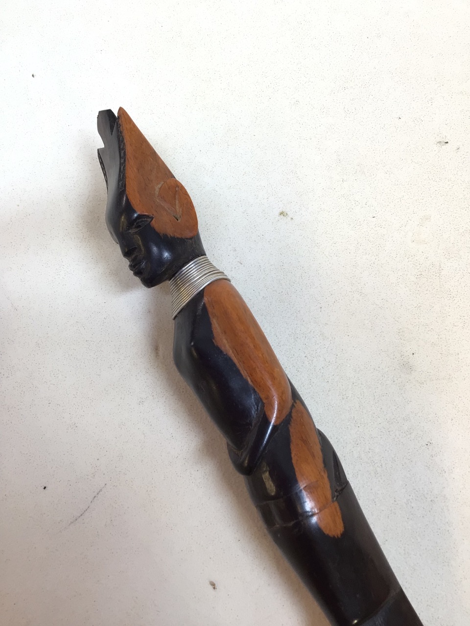A carved figural ebony letter opener with metal collar Length 38cm - Image 3 of 5