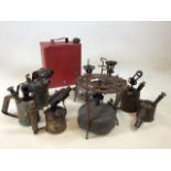 A vintage red petrol can together with three Prius stoves and five blow torches torches W:24cm x H: