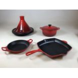 A Le Creuset tagine, griddle pan and casserole dish (20cm width) together with another dish