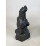 Bronze statue of a Sea Lion and its young. Stood upon a coastal rock base. W:23.5cm x D:20cm x H: