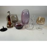 A collection of large coloured glass items.