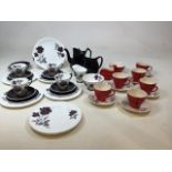 A Royal Albert Masquerade part tea set together with a black tea pot and jug also part tea set of