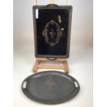 A pewter tray stamped Brufords Devon Pewter together with a mid century glass bottom tray W:46cm x