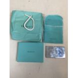 TIFFANY AND CO silver card holder marked tiffany and co 925. 57 grams. With original pouch box and