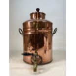 A Copper tea urn with brass tap Stainless kitchen equipment London. H:48cm