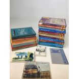 A collection of Haynes car manuals together with an Anglian Owners handbook and others