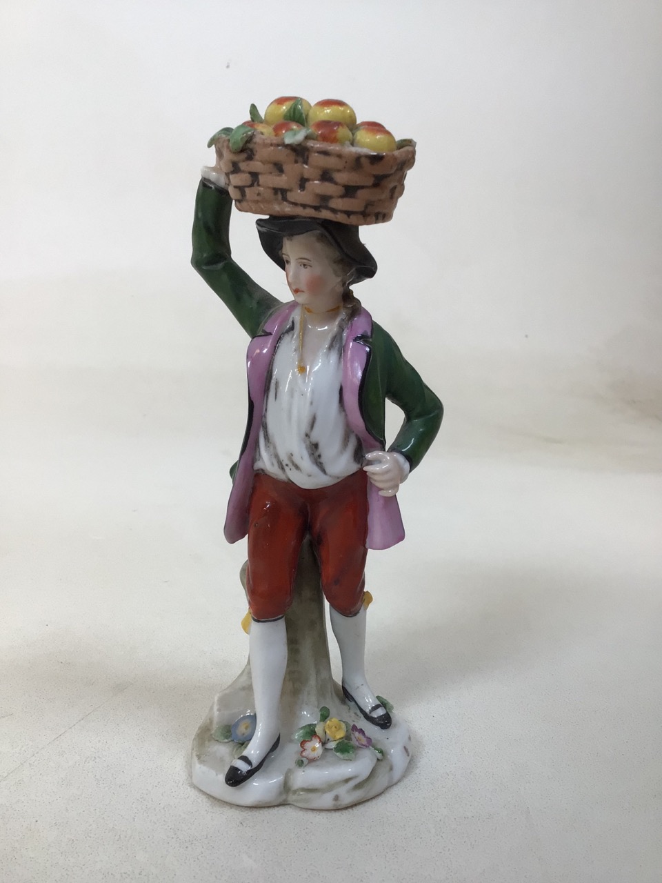 A Capodimonte footed lidded ceramic box decorated with children together with three decorative - Image 6 of 8
