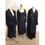 Early 20th century black lace items including a fringed Cornelli embroidered coat, a lace skirt, a