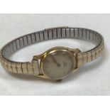 A ladies omega gold watch. With 18ct gold back. On a Speidel USA flex chain. Untested.