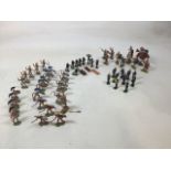 A collection of Britains and Elastolin soldiers. Includes Elastolin Roman soldiers, horsemen,