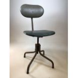 A vintage metal framed, adjustable office chair with vinyl seat. Height adjustable by screw