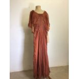 A flame and coral coloured two layered silk chiffon 1930s evening dress with hand beaded embellished
