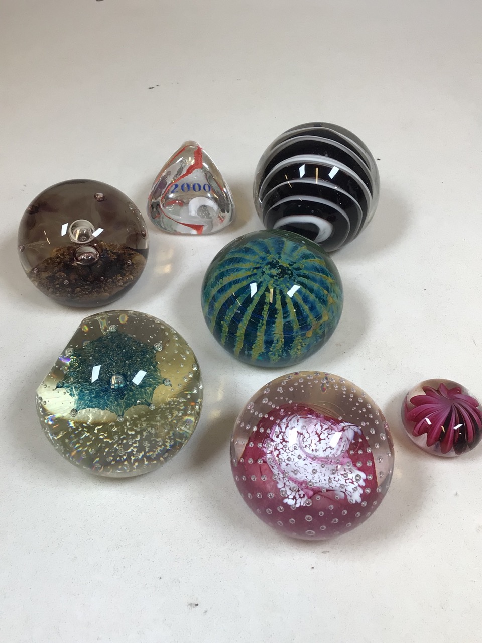 A quantity of paperweights including Caithness and Selkirk