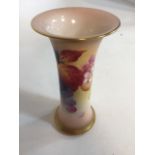 A Royal Worcester Trumpet vase G923 decorated by Kitty Blake with hand painted autumnal fruit.