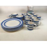 A quantity of TG Green Cornishware. Including five dinner plates , thirteen mugs, a bowl and other