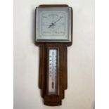 A Shortland Smiths SB British Art Deco oak cased barometer. H:45cm