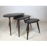 A set of mid century Ercol Pebble tables W:64cm x D:45cm x H:41cm Dimensions of largest table