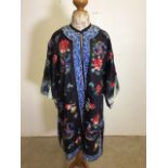 Vintage embroidered kimono style coat with blue and white embroidered trim. Some stains to sleeve