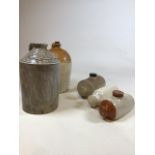 A collection of stoneware to include a flagon by H Heaton, Springfield Soap Works, Bradford Height