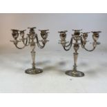 A pair of silver plated candelabrum