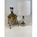 A brass kettle on stand also with a retro onyx lamp.