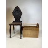 A carved hall chair also with hand made tool box. W:40cm x D:38cm x H:103cm
