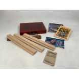 A decorative cased Mahjong set with metal handles and trims together with four wooden tile racks and