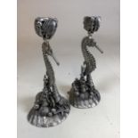 Pair of vintage seahorse pewter candlesticks, with mark to verso for Figura Piero, Per Atena.