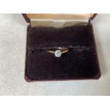 A diamond solitaire gold ring approx 0.40 cts. Worn hallmarks. Size 6
