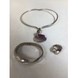 A heavy silver choker, bangle and ring. Ring stamped 3528 & 925, bangle stamped 3528 and choker