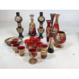 A collection of vintage Murano style hand painted glass including two oils lamps, glasses, vases and