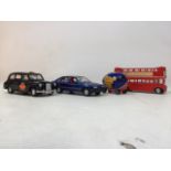 Vintage Corgi scale models, including London Taxi and Routemaster Bus, Ford Sierra Ghia and the