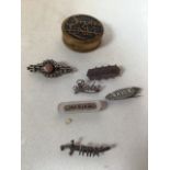 Silver name brooches together with other brooches and a stud and links box