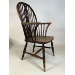 A Victorian elm and beech Windsor stick back armchair. Stamped 1394. Seat height H:42cm