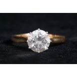 A diamond solitaire ring approx 3.12 cts in an eight claw setting in 18ct yellow gold and