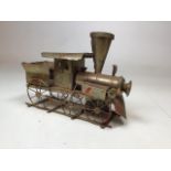 A metal train with a musical wind up mechanism (not working) W:25cm x H:17cm