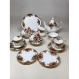 Royal Albert Old Country Roses Tea Set. Includes cake plate, large tea pot, six cups and saucers and
