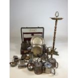A collection of metal ware including a wooden and brass ashtray on stand, silver plate, brass and