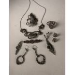 Assortment of Marcasite jewellery to include ring, brooch, necklace and earrings.