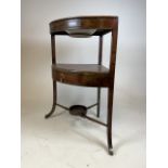An early 20th century corner wash stand with lift up lid to bowl, shelf with drawer beneath. W: